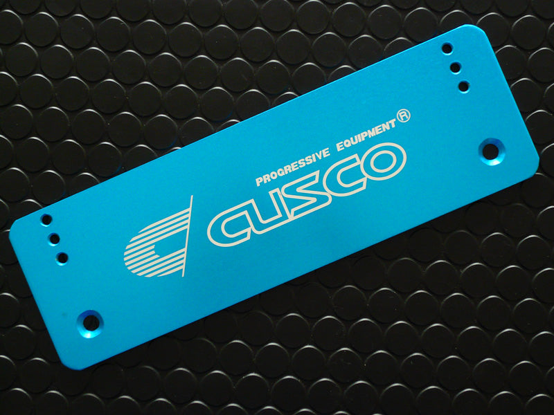 Cusco License Plate Relocation Offset Plate Universal-Type 3-ways Height Adjustable Plate. Aluminum. Blue Anodized.